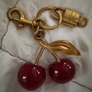 Louis Vuitton Lock & Key (315) with Red Cherry Bag Charm with Gold Accents